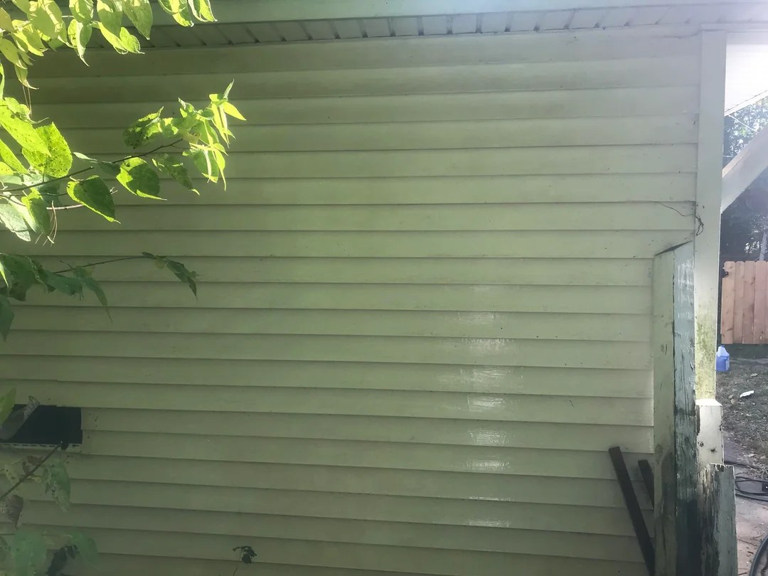 The same vinyl siding, bright and evenly clean after soft washing